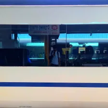 A self-photograph of Karthikeyan KC from the reflection on the windows of the Vande Bharat Express train.